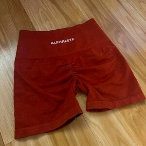 Red Alphalete biker shorts, seamless, butt scrunch. Small. Never worn.